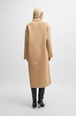 Abrigo largo oversize fit con cierre cruzado