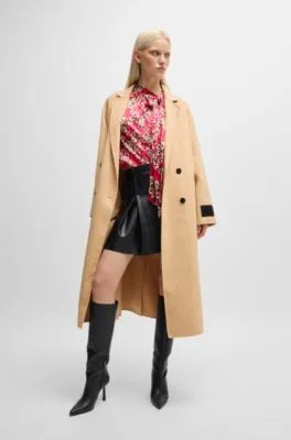 Abrigo largo oversize fit con cierre cruzado