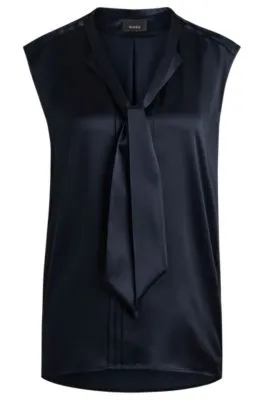 Blusa de seda sin mangas con lazo en el cuello