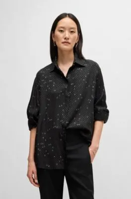 Blusa holgada con estampado y jacquard de puntos