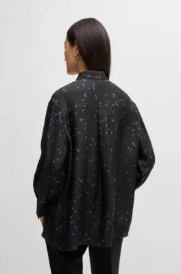 Blusa holgada con estampado y jacquard de puntos