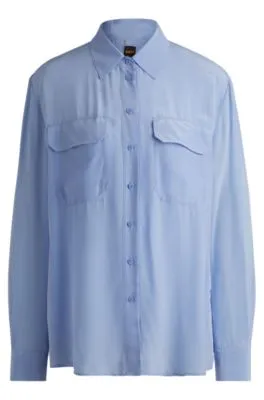 Blusa relaxed fit en lona lavada a la arena con cuello en pico