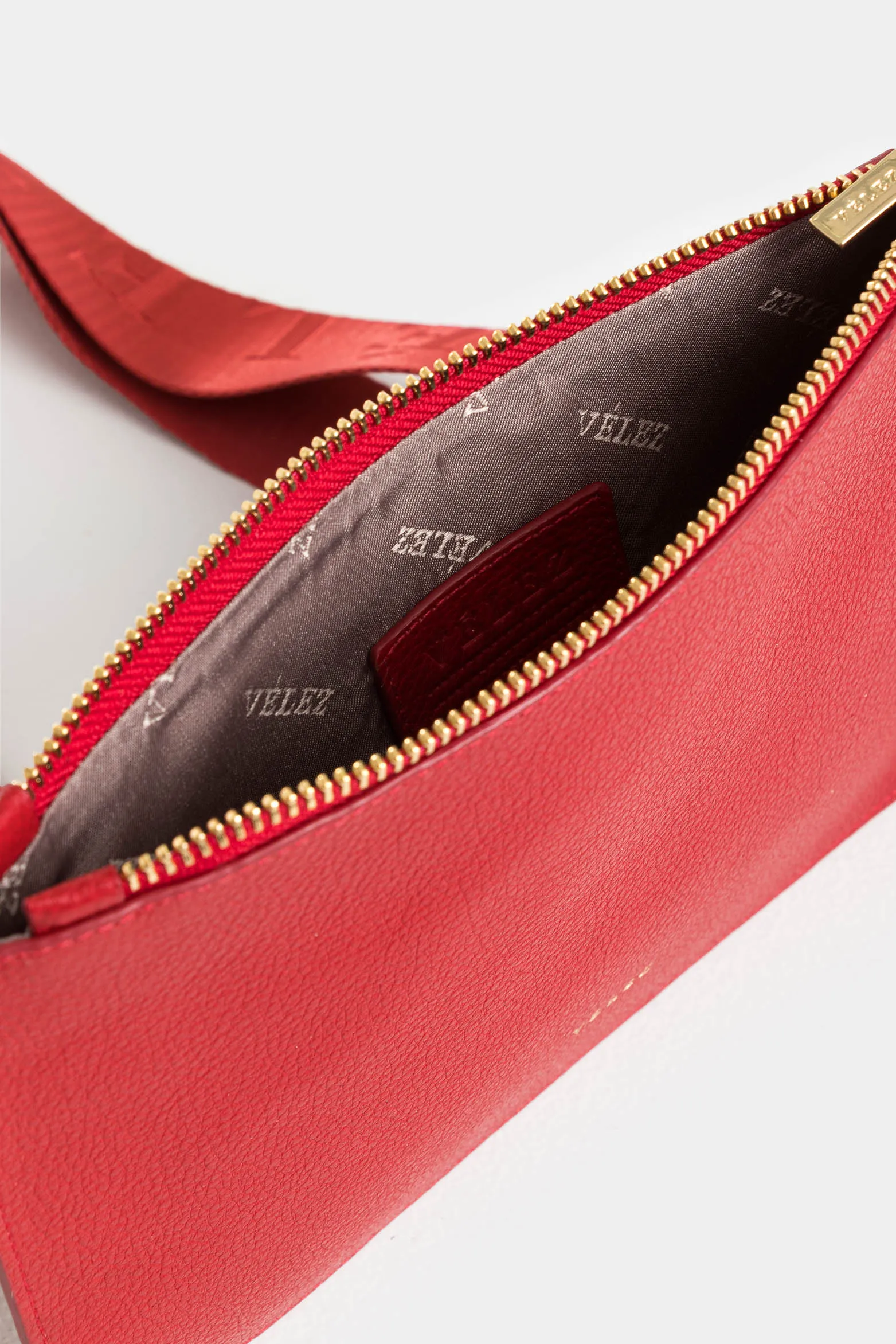 Cosmetiquera delfos de cuero para mujer cargadera removible