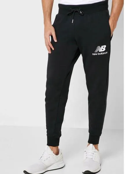 pantalon new balance negro hombre