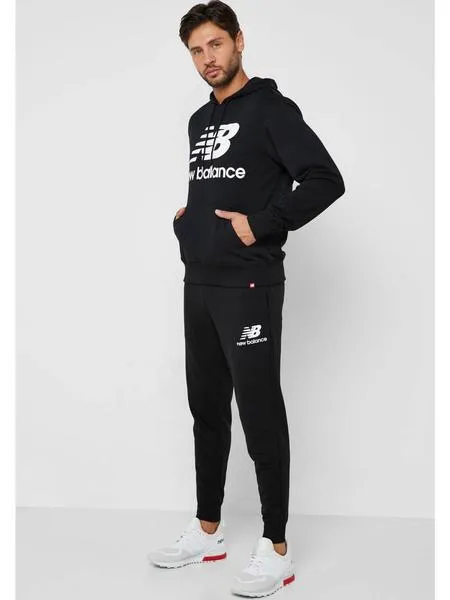 pantalon new balance negro hombre