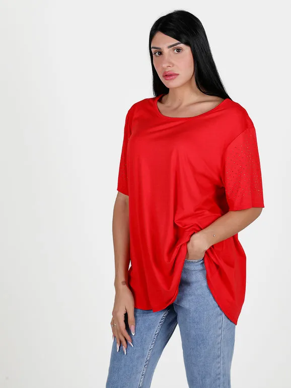 Solada Maxi camiseta de mujer con pedrería en las mangas.
