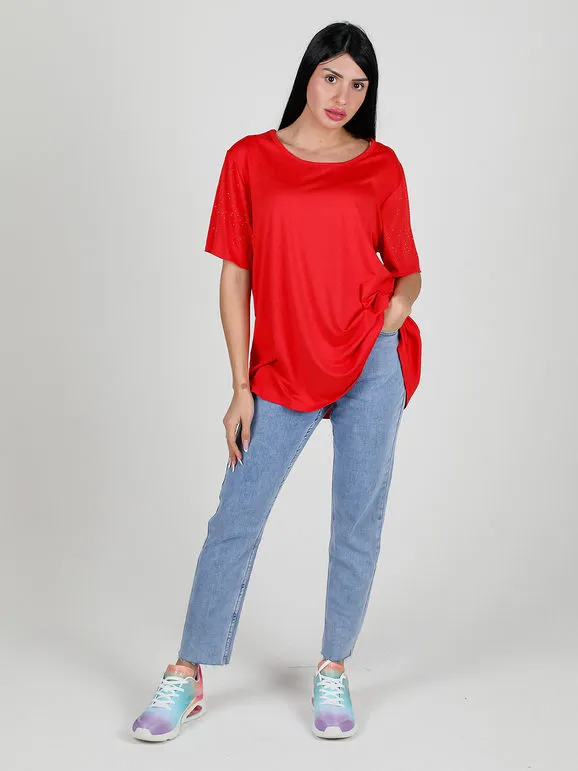 Solada Maxi camiseta de mujer con pedrería en las mangas.