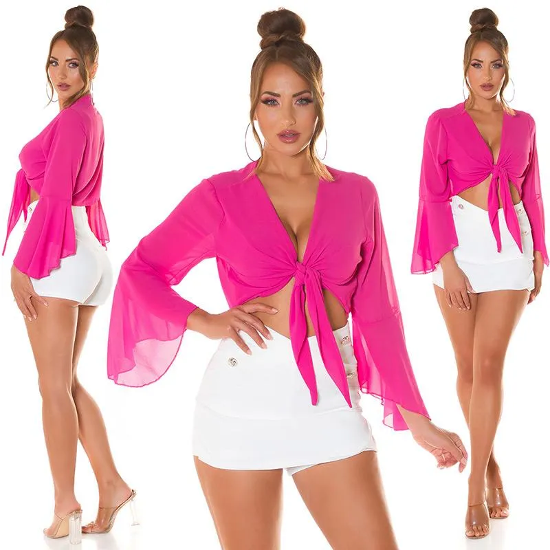 Top corto con nudo delantero rosa