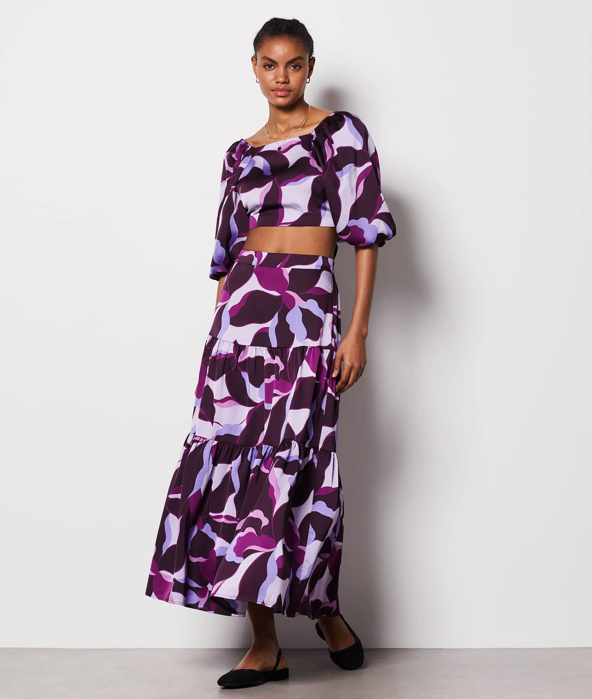 TOP MANGA CORTA ANUDADO ESPALDA UZES IMP FD VIOLET.  ETAM