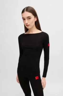 Top térmico slim fit con etiqueta con logo roja