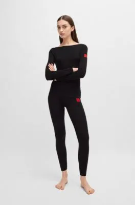 Top térmico slim fit con etiqueta con logo roja