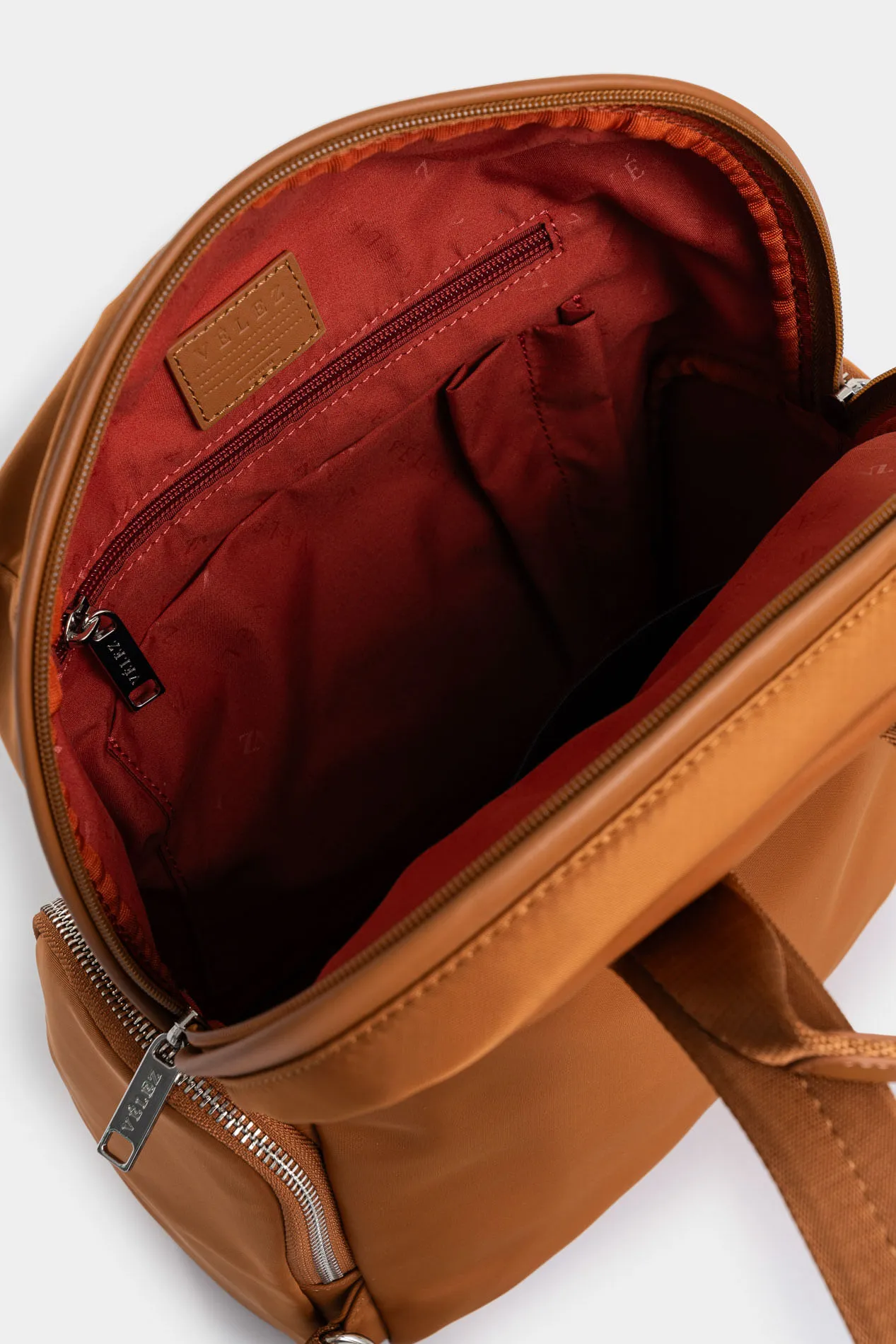 Tula morral Orión de lona y cuero para mujer detalle trenzado