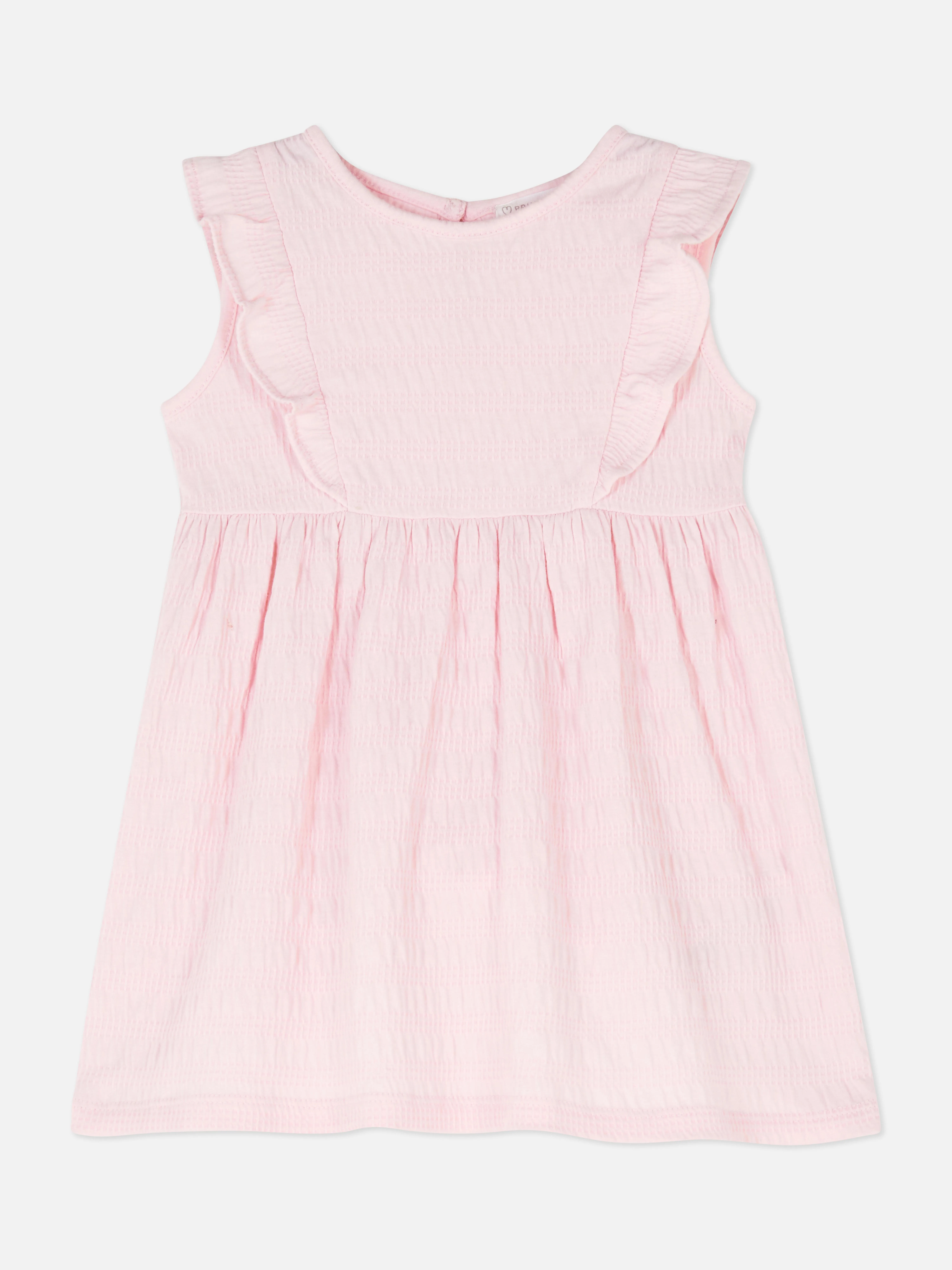 Vestido fruncido con volantes