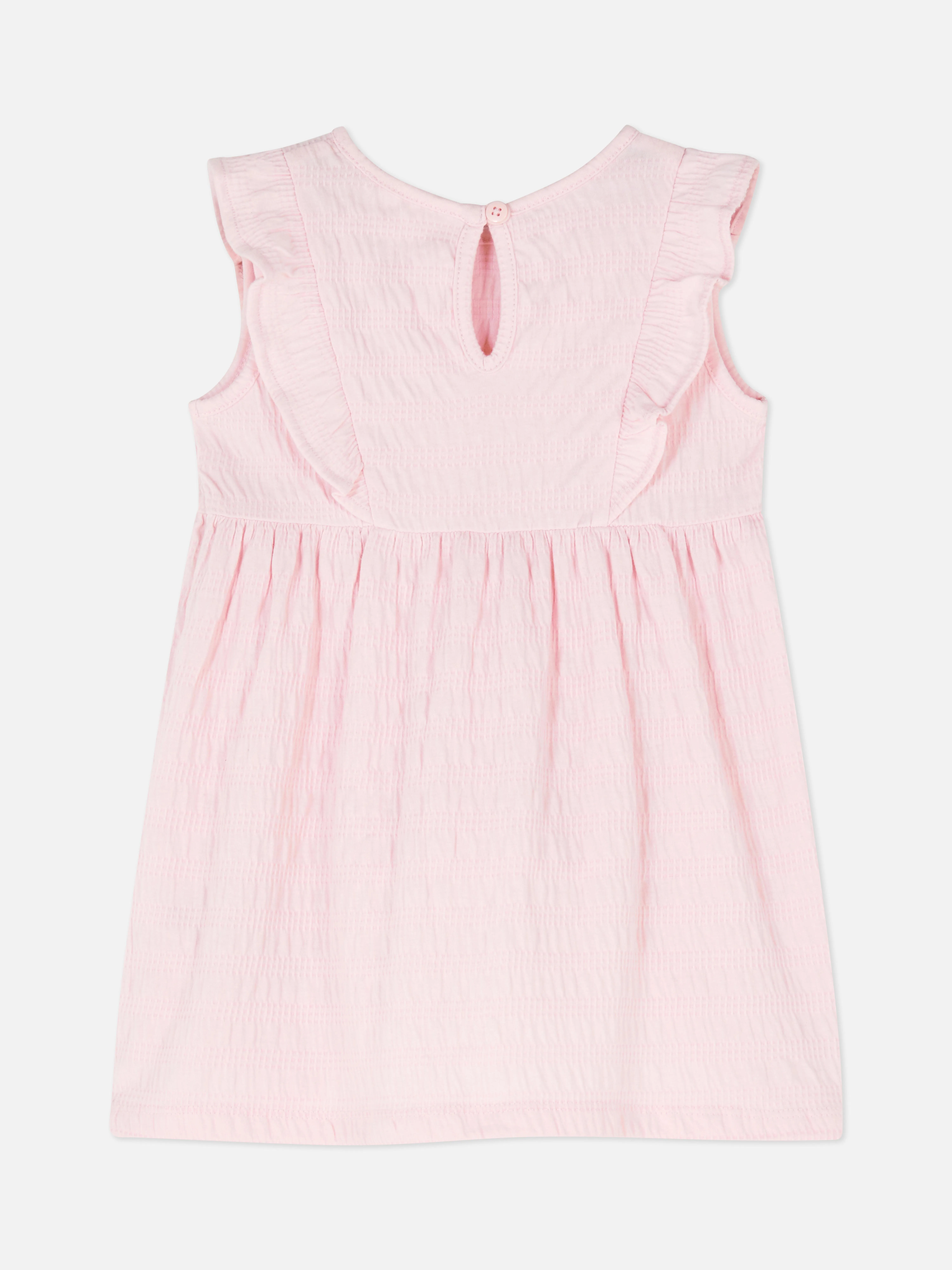 Vestido fruncido con volantes