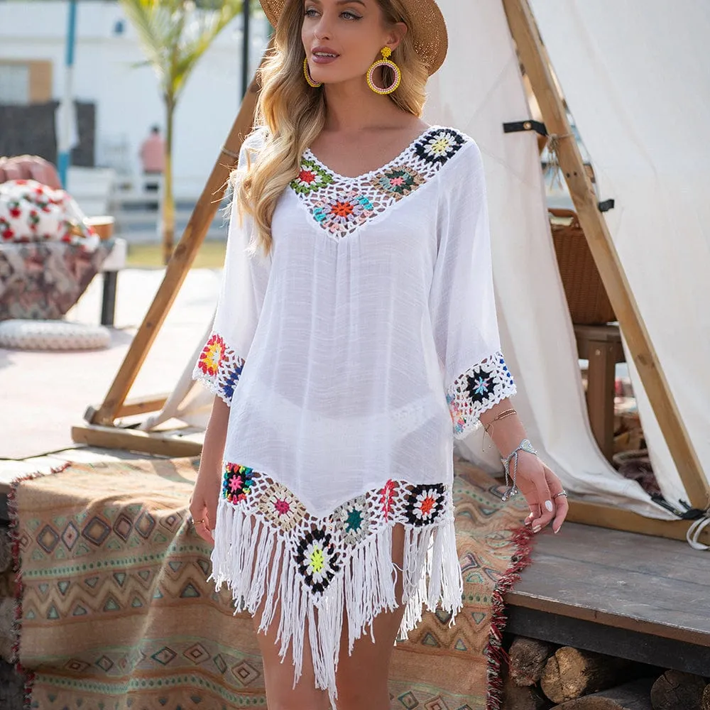 Vestido playero con bordado y flecos