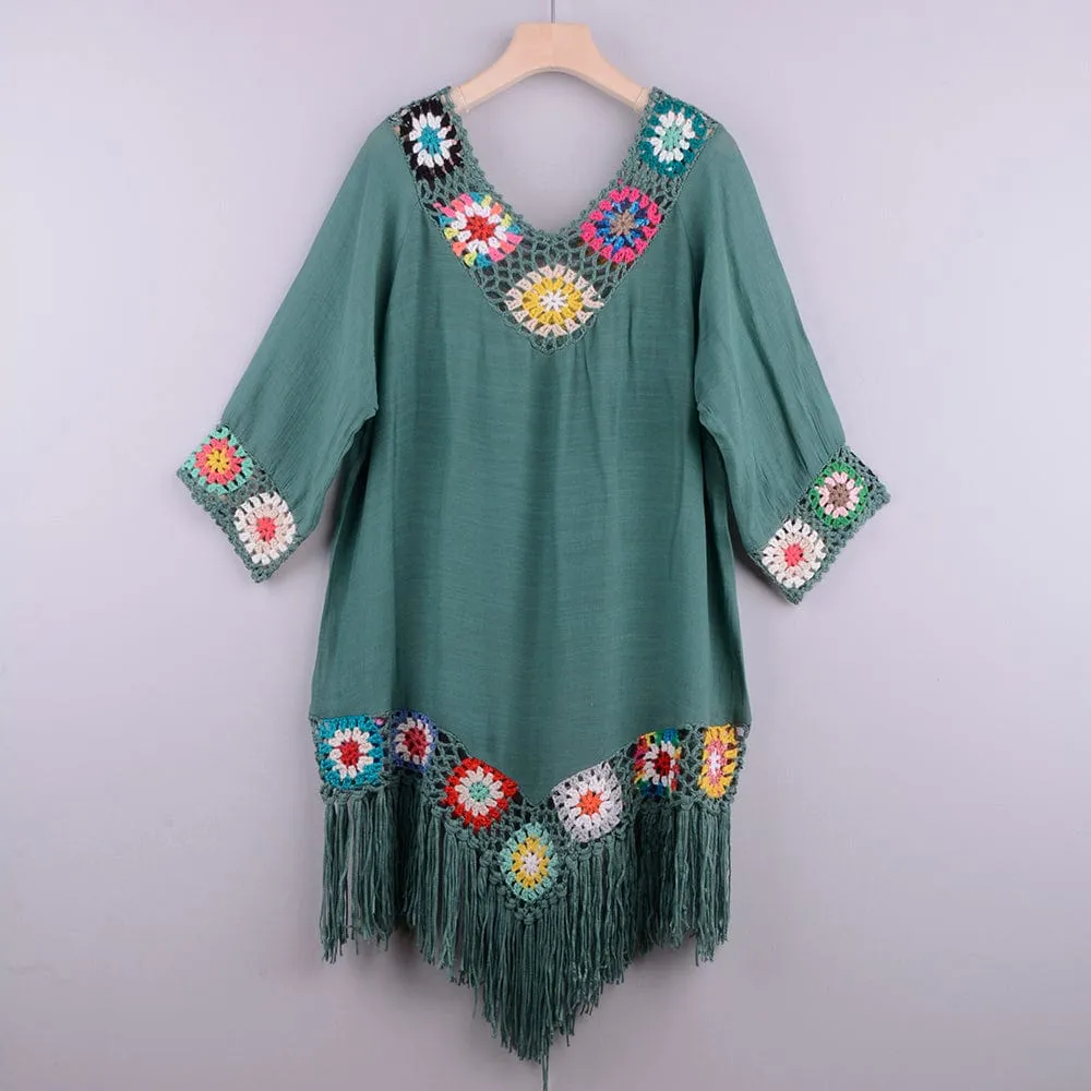 Vestido playero con bordado y flecos