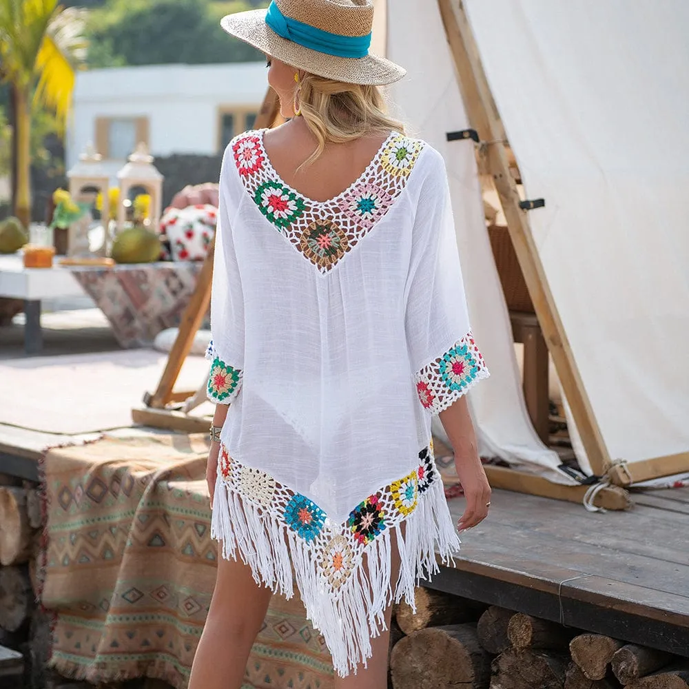Vestido playero con bordado y flecos