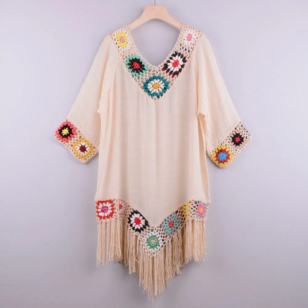 Vestido playero con bordado y flecos